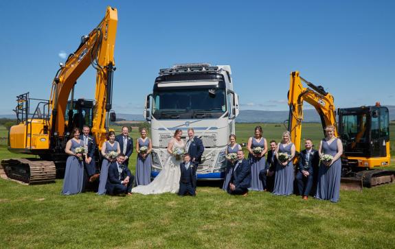 News and Star: The couple celebrate with their groomsmen and bridesmaids News and Star: The couple celebrate with their groomsmen and bridesmaids