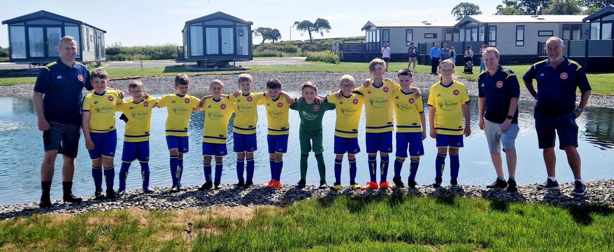 Carlisle kids’ football team delighted over local kit sponsorship