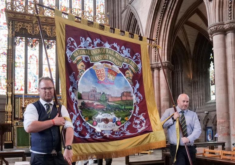 Carlisle RMT mark new banner with special march and service