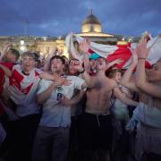Fans celebrate in Trafalgar Square after England's win over Ukraine (photo: PA)