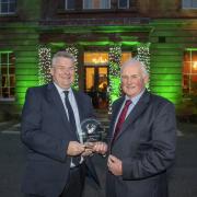 LIFETIME ACHIEVEMENT: Will Rawling, right, receives his award from Andrew Robinson, head of agriculture and farming at Armstrong Watson. Picture: Jonathan Becker, beckerphoto.co.uk