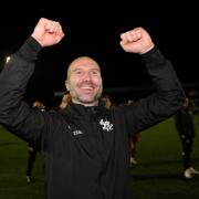 Russell Penn celebrates Kidderminster's famous victory (photo: PA)