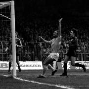 Paul Simpson celebrates a goal for Manchester City in 1986 (photo: PA)