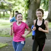 FUN: Tilda Hollins and Ciara Edmondson take part in a 2016 Junior Parkrun in Carlisle
