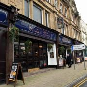 Woodrow Wilson's Wetherspoons will mark its 25th birthday will a charity bake sale and pint offers. 