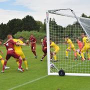 Brennan Dickenson, centre, watches the ball find the Morton net (photos: Amy Nixon)