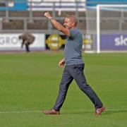 Paul Simpson punches the air after Carlisle's victory (photos: Barbara Abbott)