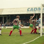 David Reeves, arm raised, scores the crucial goal at Colchester in 1995