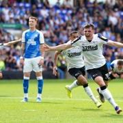 Jack Stretton celebrates his goal for Derby against Peterborough in the Championship last season (photo: PA)
