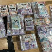 Suspect cash seized by the police.