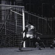 Peter Shilton, right, watches as Paul Proudlock's shot finds the net