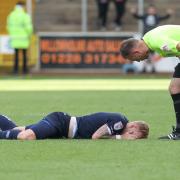 Callum Guy is down in pain late in the Crewe game (photo: Ben Holmes)