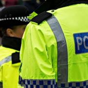 A police officer had to take evasive action because of an attempted headbutt.