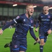 Callum Guy celebrates scoring Carlisle’s second goal