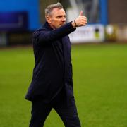 Paul Simpson salutes the fans after the Colchester win