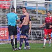 Paul Huntington protests to ref Tom Reeves