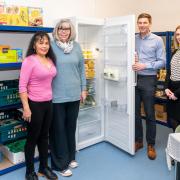Staff from The Cumberland visit the food bank at Brampton Community Centre. Left to right: Food bank volunteers Lourdes Harding and Vivienne Harvey, and The Cumberland Staff Barry Ridley and Rebecca Burney.