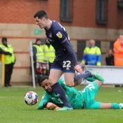 Jon Mellish goes around Lawrence Vigouroux - but can't find the net