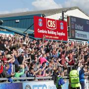 Fans in the Waterworks End celebrate the opening goal