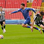 Jordan Gibson skips past a Newcastle challenge