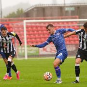 Alfie McCalmont in action against Newcastle Under-21s