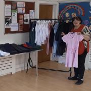 Heather Watson, community support worker at The Salvation Army Penrith with uniform donations