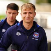 Fin Back arrives with the Carlisle squad at Chorley on Tuesday