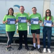 Egremont Coop workers raised more than £1000 for Samaritans with their skydive