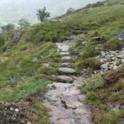 Lake District hotspots including Scafell Pike and Helvellyn at risk from extreme weather and summer footfall