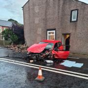 Brampton crews called to Newton after car crashes into garden wall