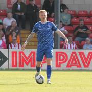 Callum Guy made his 150th United appearance at Lincoln