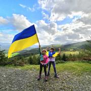 Sisters Nicoletta, 9 and Emilia, 6, in Whinlatter raising funds for Ukraine