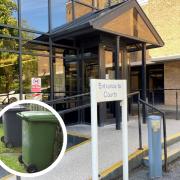 The defendant committed arson by setting a wheelie bin on fire
