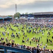 Scenes from May's pitch invasion