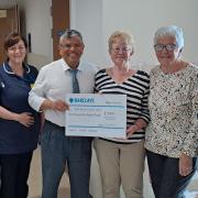 The handover of the cheque to the West Cumberland Breast Cancer Clinic