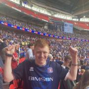 Ross Mattinson celebrating Carlisle United's promotion to League One at Wembley in May 2023
