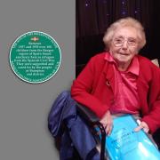 Carmen Santibanez Cid pictured alongside the plaque to go up at at the home on Union lane