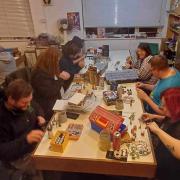 A miniature painting session in full swing at Carlisle Gamers