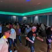 The 80s disco night helped to raise £1120