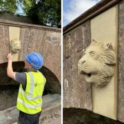 Lion's head ornament installed