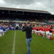Tony Hopper returns the applause of the crowd, and Carlisle and Workington team-mates, at last May's charity game at Brunton Park