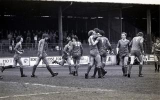 United players celebrate with hat-trick hero Andy Hill