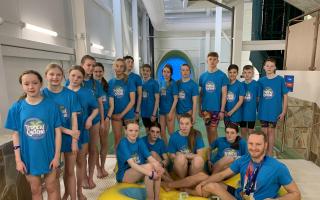 Members of Cockermouth Swimming Club with Luke Greenbank, Olympic gold-medallist, before they took on the Tropical Cyclone ride at Center Parcs Whinfell Forest.