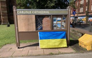 A Ukraine flag was left outside of the cathedral