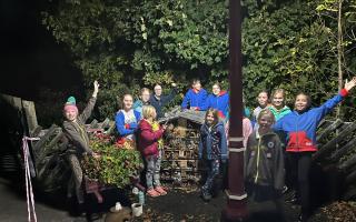 Girlguiding group at Settle Station with their bug hotel