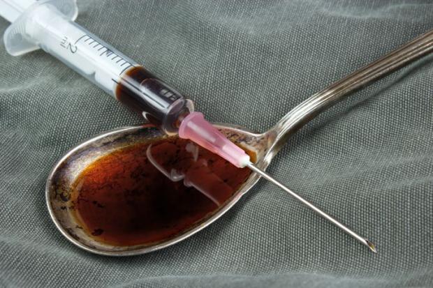 News and Star: GENERIC PICTURE --- Drug syringe and cooked heroin on spoon
