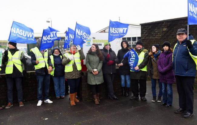 Staff members taking part in a previous strike
