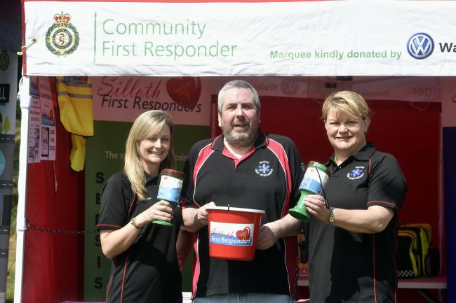 The team on the Silloth Community First Responders stall are, from left, Lori Quayle, team leader Peter Gilmour and Judy Williamson, during the Silloth Green Day event, 26 May 2019  LOUISE PORTER.