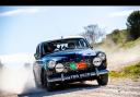 The couple driving a 1966 Volvo Amazon 132S