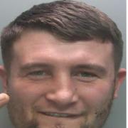 Louie Holmes, 29, from Carlisle is wanted on recall back to prison.